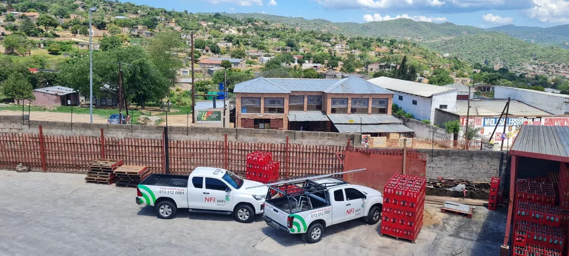 Two NFI WiFi service bakkies working in the community
